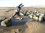 SX25527 Jenni jumping of rock.jpg